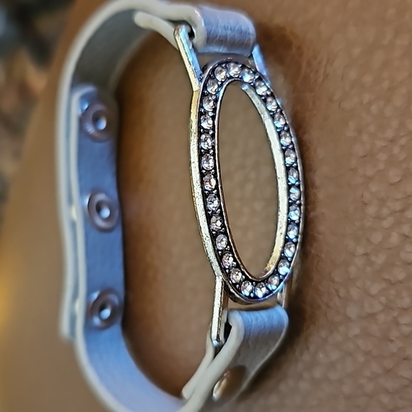 3/$20 PAPARAZZI Another Round Rhinestone Oval Faux Leather Snap Bracelet - Picture 3 of 4